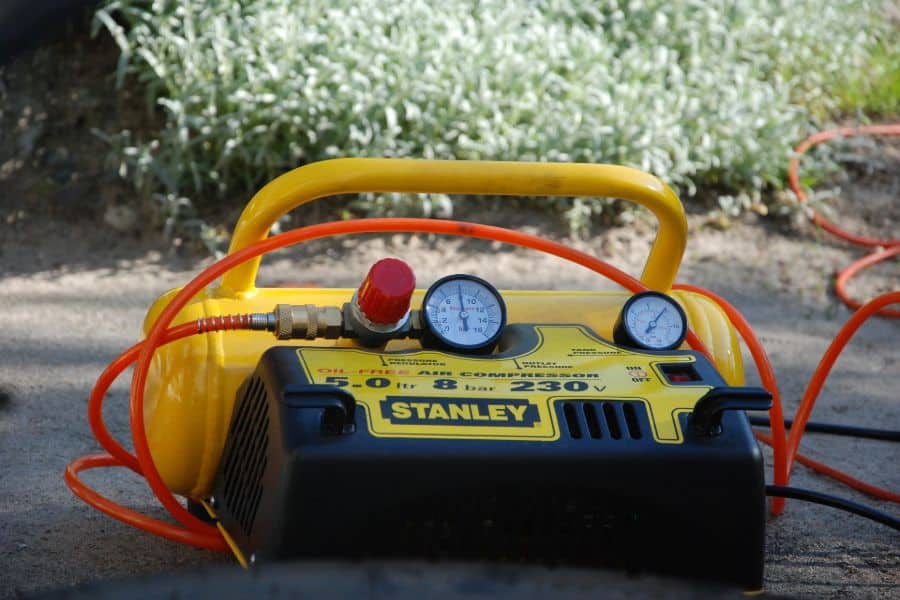 A small air compressor used to inflate tires