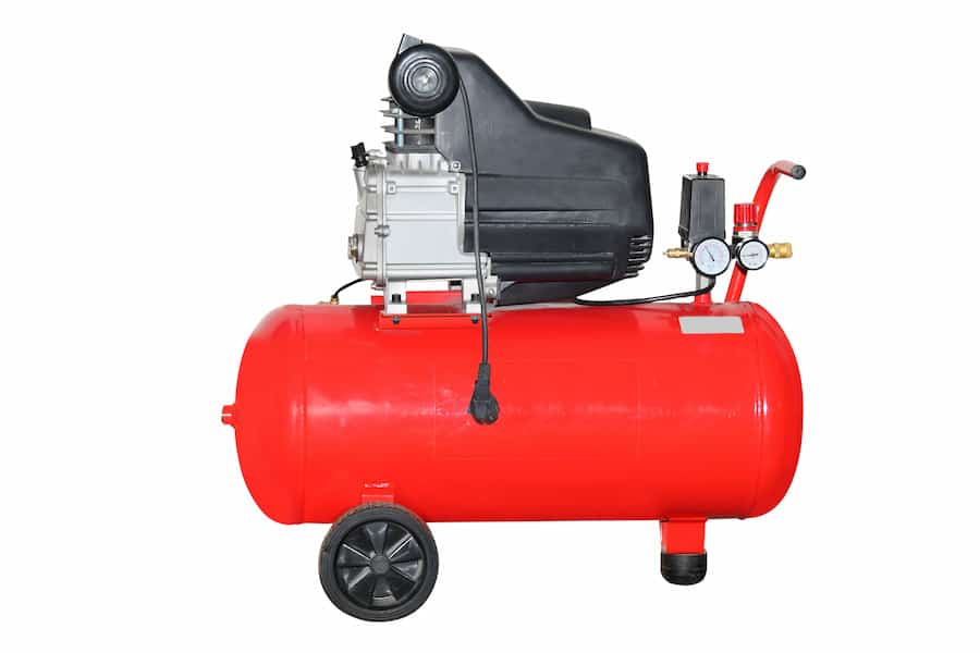 A red colored air compressor