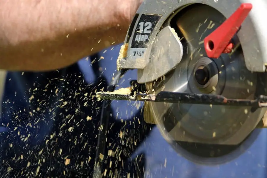 A person cut and angle using circular saw