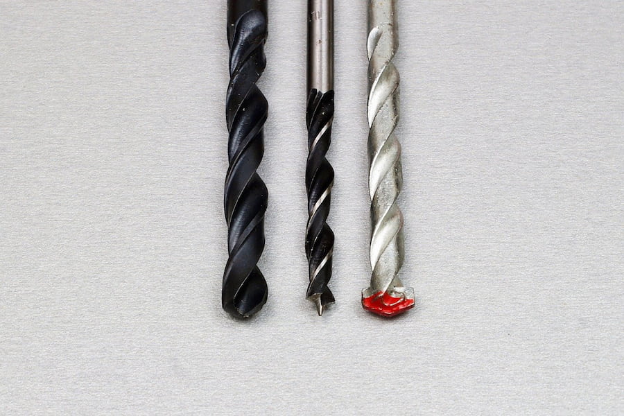 Three different types of drill bit