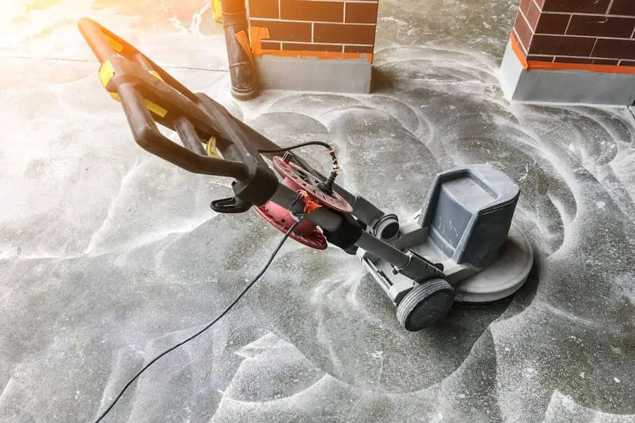 An image of a sanding machine on concrete