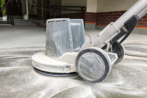 An image of how to sand concrete using a machine