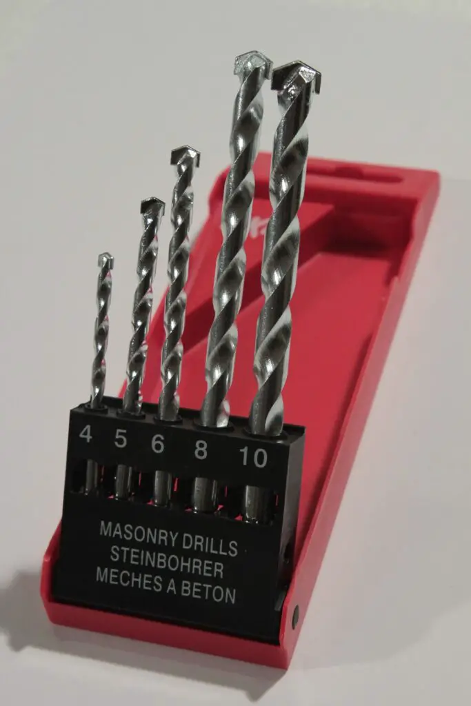 Drill bits all lined upright on their box