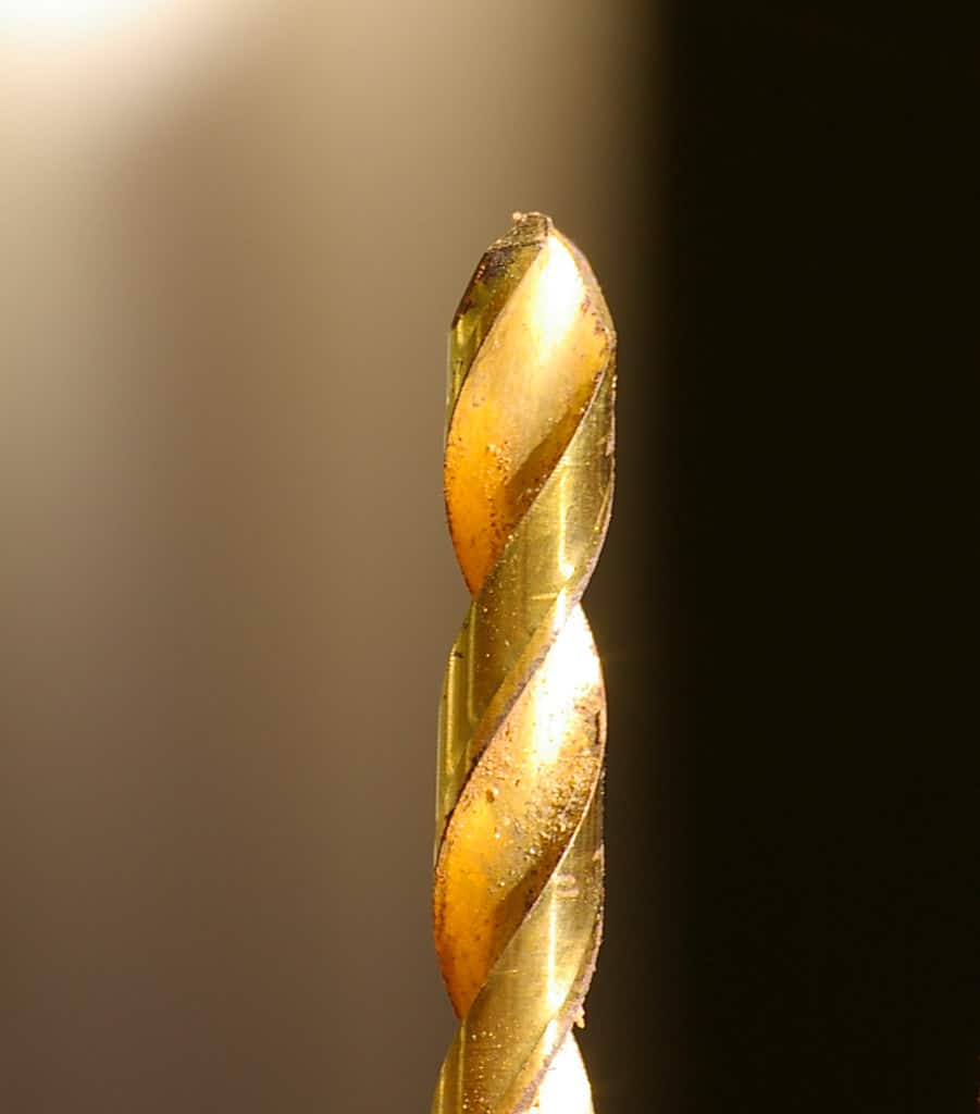 Close up of a gold drill bit