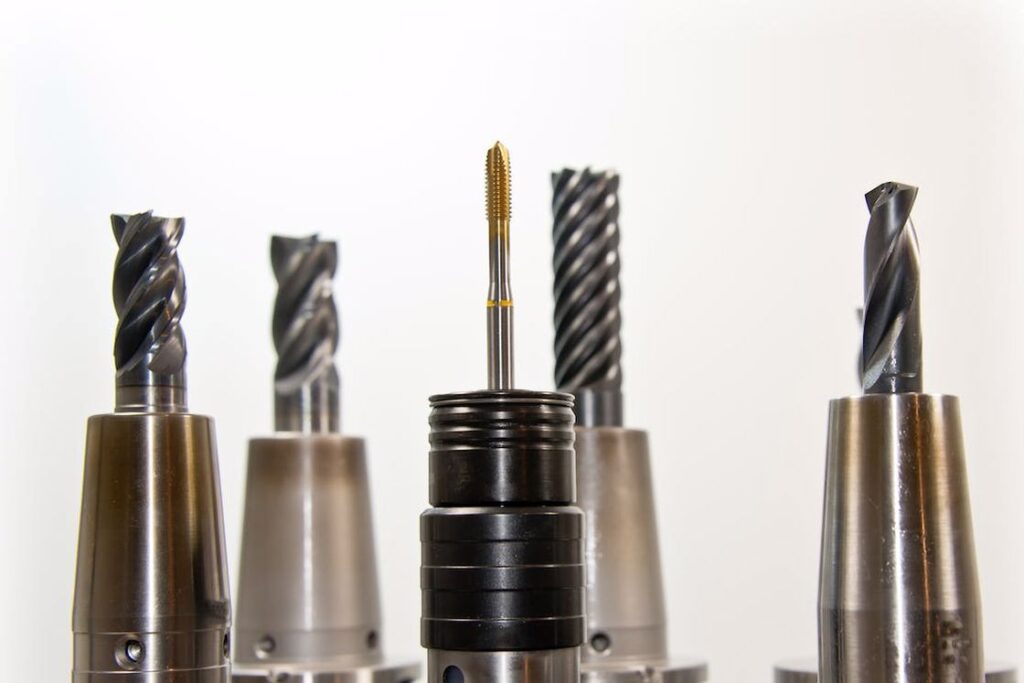 Different kinds of drill bits placed upright