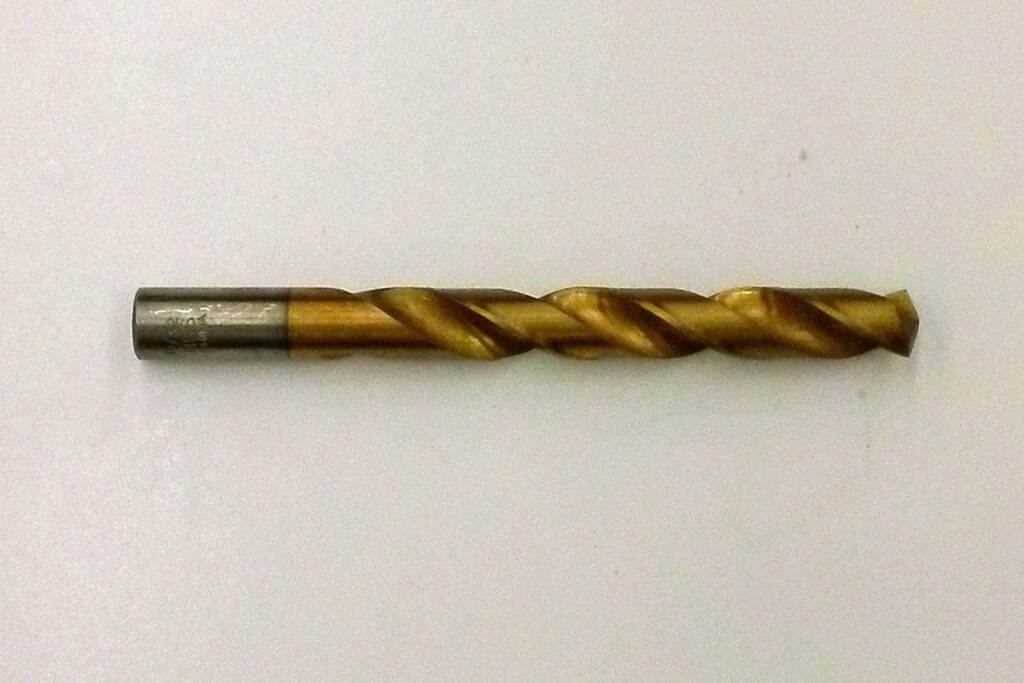 Gold and silver drill bit