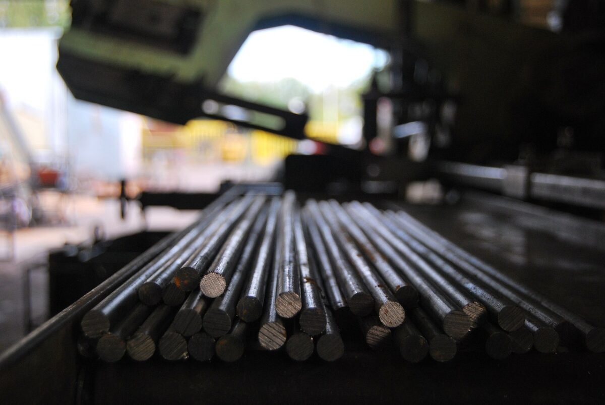Metal rods being piled up together
